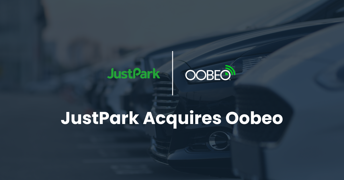A promotional graphic showing the logos of JustPark and Oobeo above the headline "JustPark Acquires Oobeo", set against a blurred background of parked cars.
